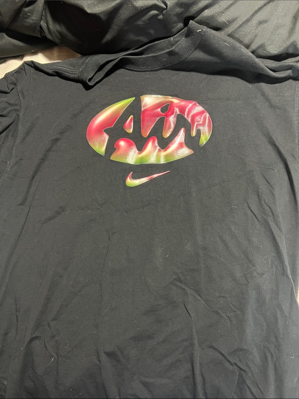 Nike Men’s Black Short Sleeve Tee with Red and Green Gradient Logo
